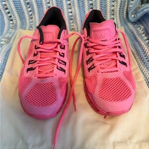 Nike Pink Athletic Shoes with Mesh Upper and Cushioned Midsole